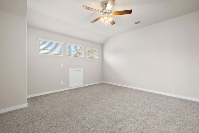 2213 Rocoso Trl, Leander, TX 78641 - empty room with ceiling fan, carpet, baseboards, and lofted ceiling