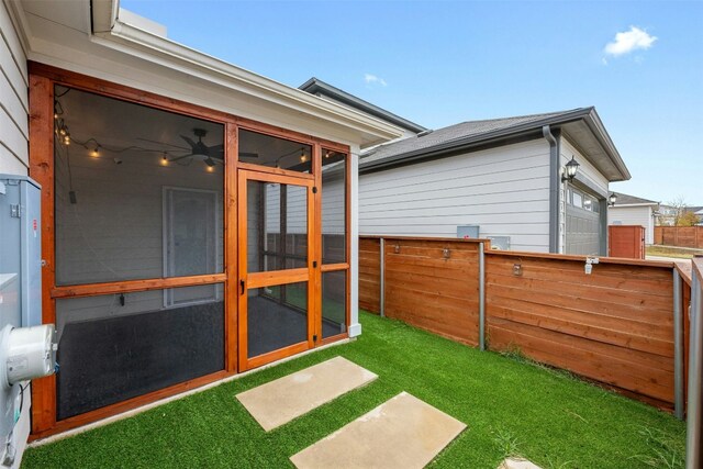 view of yard with a sunroom