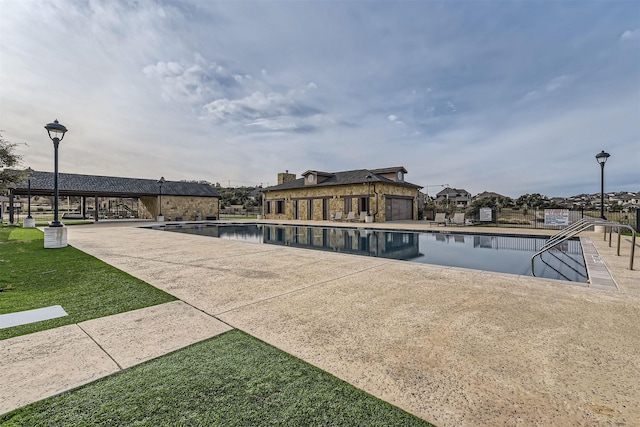 exterior space featuring a patio and a community pool