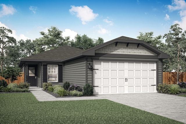 view of front of property featuring a front yard and a garage