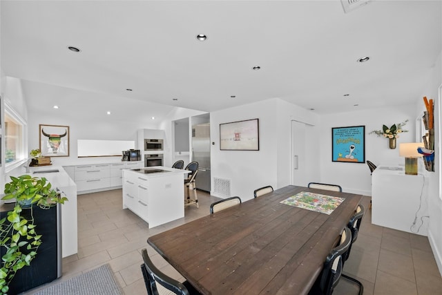 1603 Twilight Ridge Dr, Austin, TX 78746 - dining space with light tile patterned flooring and recessed lighting