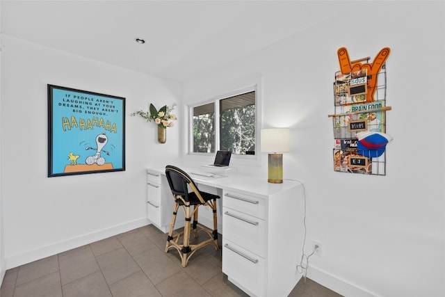 1603 Twilight Ridge Dr, Austin, TX 78746 - office area featuring baseboards and tile patterned flooring