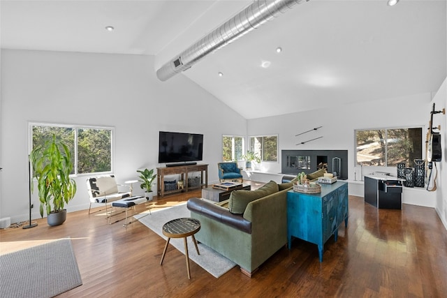1603 Twilight Ridge Dr, Austin, TX 78746 - living area featuring beamed ceiling, high vaulted ceiling, and dark wood finished floors