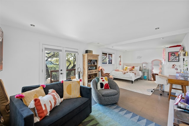 tiled living room featuring french doors