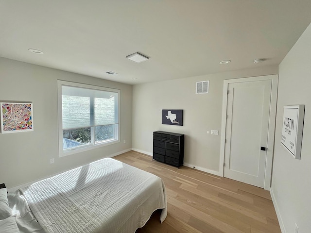 bedroom featuring light wood-type flooring