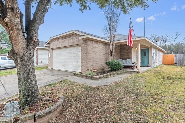 ranch-style house featuring a garage and a front yard