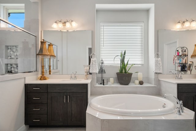 17820 Limestone Spring Ln, Austin, TX 78738 - full bath featuring a bath, two vanities, and tiled shower