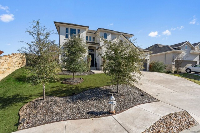 view of front of home featuring a front yard