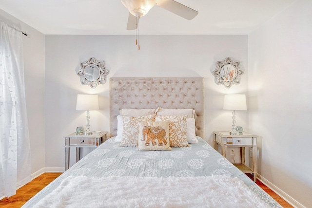 bedroom featuring ceiling fan and wood-type flooring