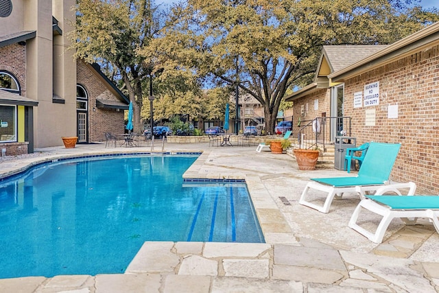 view of pool with a patio area