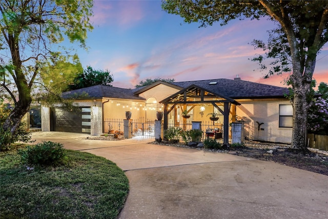 view of front of home with a garage