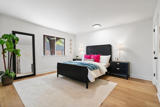 bedroom with light hardwood / wood-style flooring