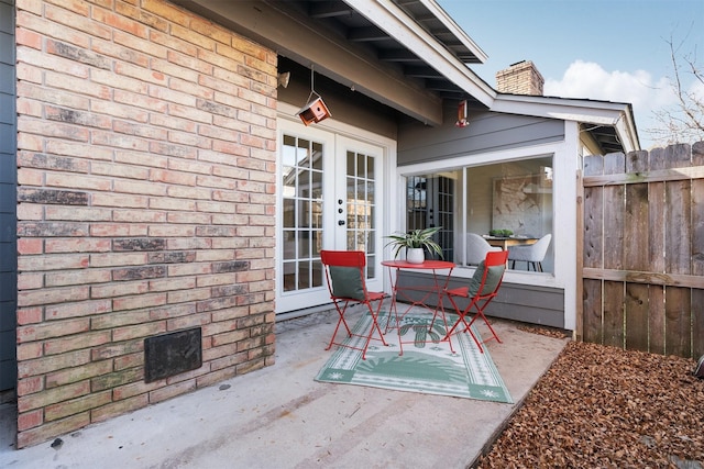 view of patio featuring french doors