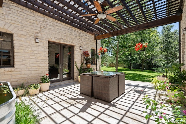 view of patio featuring ceiling fan, a pergola, and french doors