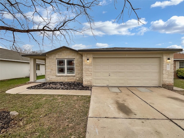 ranch-style house featuring a garage