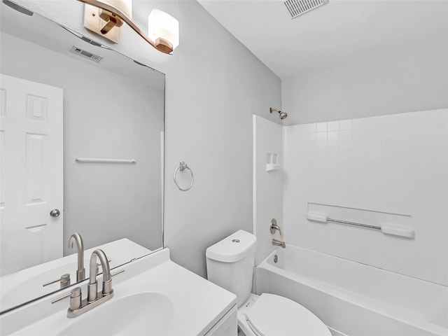 full bathroom with tub / shower combination, vanity, and toilet