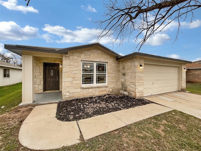 ranch-style home with a garage