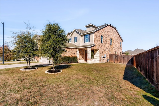 view of front of house with a front yard