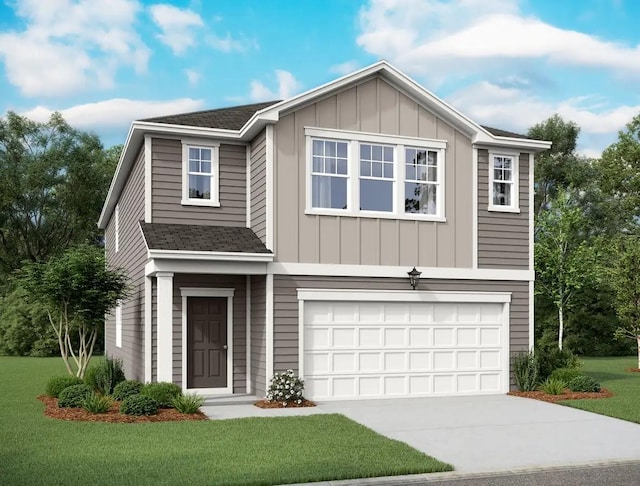 view of front facade with a front lawn and a garage