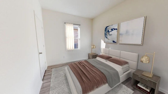 bedroom featuring light hardwood / wood-style flooring