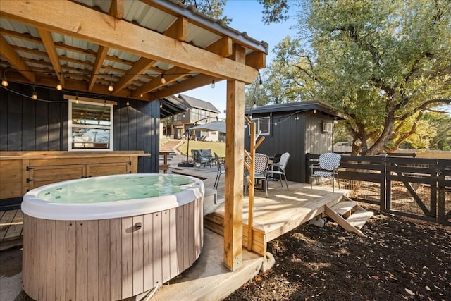 deck with a hot tub