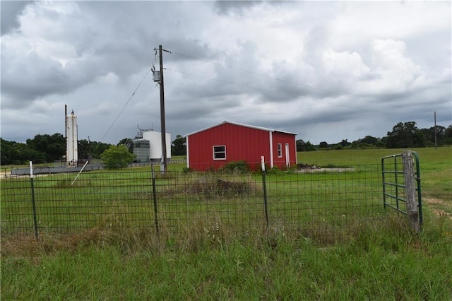 view of yard with a rural view