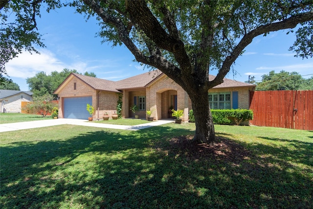 single story home with a front lawn and a garage