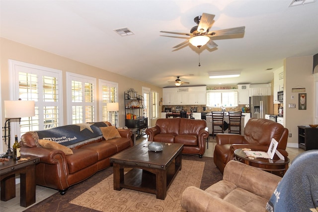 living room with ceiling fan