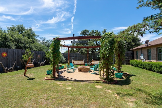 view of yard with a patio and a fire pit