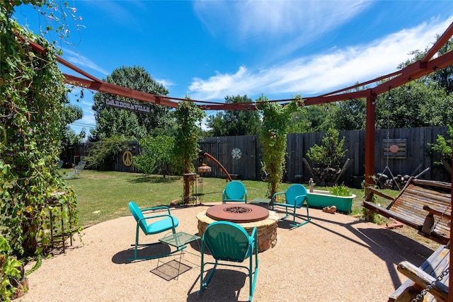 view of patio / terrace featuring a fire pit