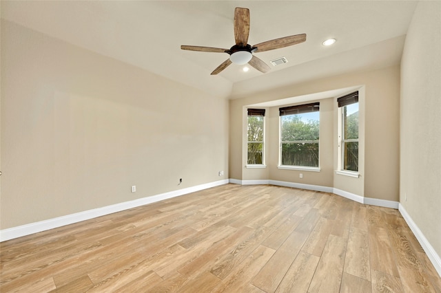 unfurnished room featuring light wood-type flooring and ceiling fan