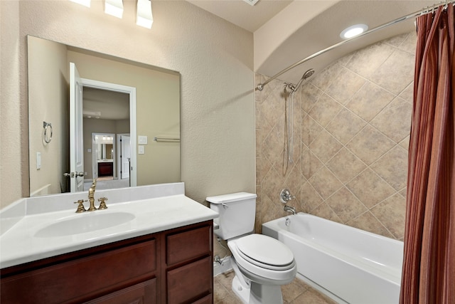 full bathroom featuring shower / tub combo, vanity, and toilet