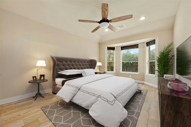 bedroom featuring ceiling fan and hardwood / wood-style floors