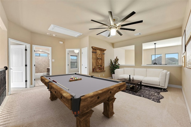 game room with pool table, ceiling fan, and light carpet