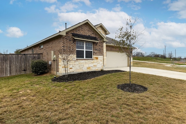 view of side of home featuring a lawn and a garage