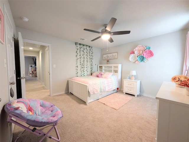 carpeted bedroom with ceiling fan