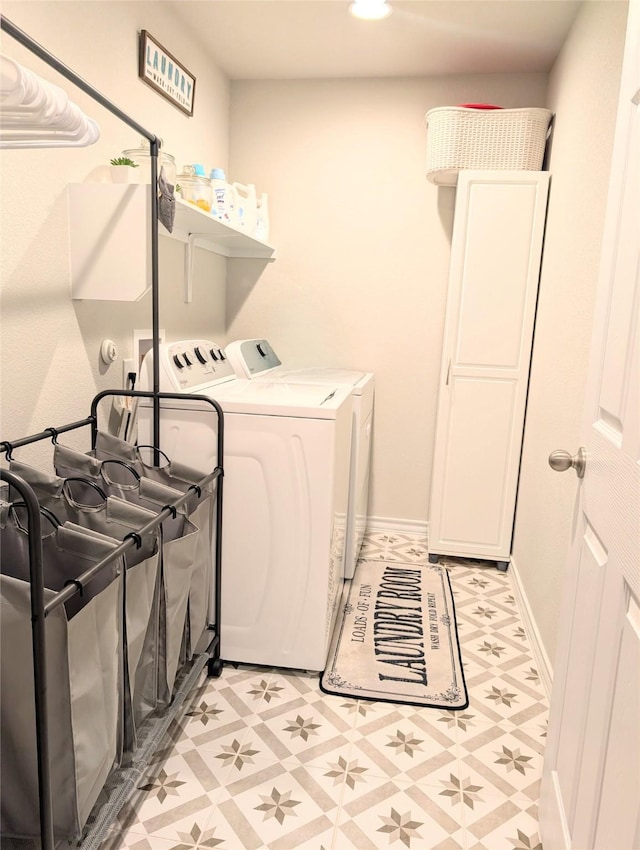 clothes washing area featuring separate washer and dryer