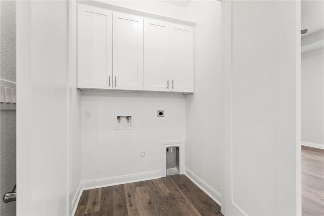 laundry area featuring cabinets, dark hardwood / wood-style flooring, electric dryer hookup, washer hookup, and hookup for a gas dryer