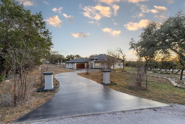 view of front of property with a garage