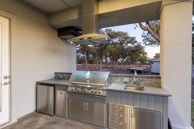 view of patio featuring sink and area for grilling