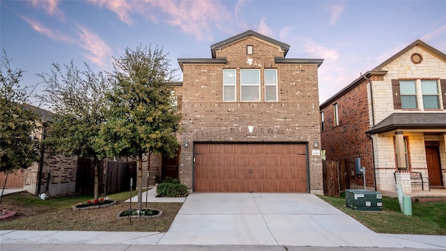 front facade with a garage