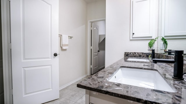 bathroom featuring vanity and tile patterned floors