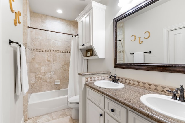 full bathroom with toilet, shower / tub combo with curtain, and vanity