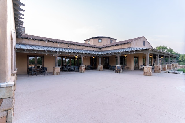 rear view of property with a patio area