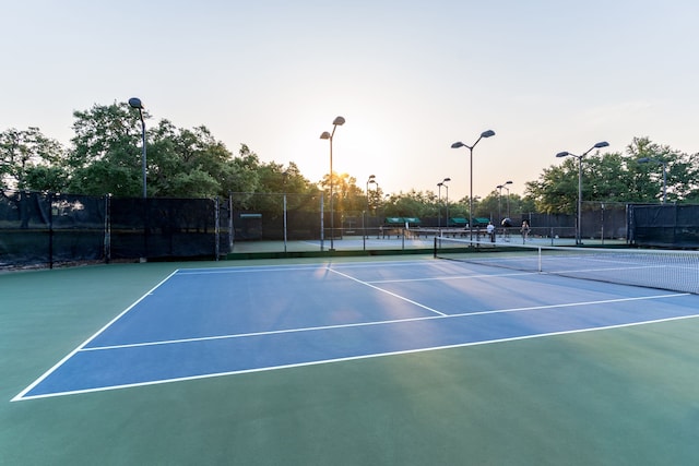 view of tennis court with basketball court