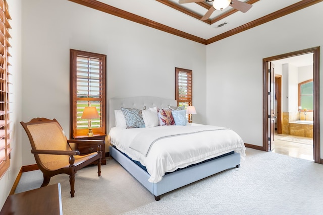 carpeted bedroom with ceiling fan, connected bathroom, and ornamental molding