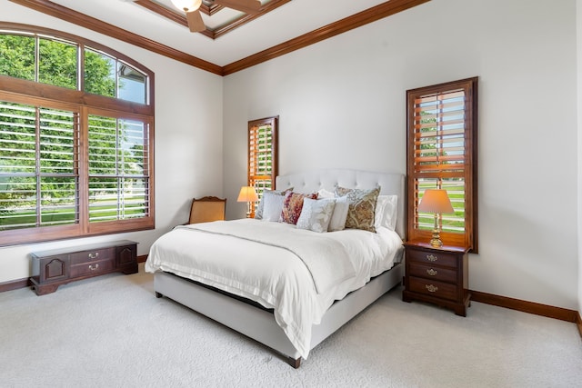 bedroom with ornamental molding, ceiling fan, and light colored carpet