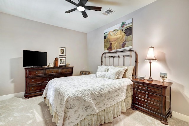 2210 Onion Creek Pkwy Unit 603, Austin, TX 78747 - bedroom featuring light colored carpet, baseboards, and a ceiling fan