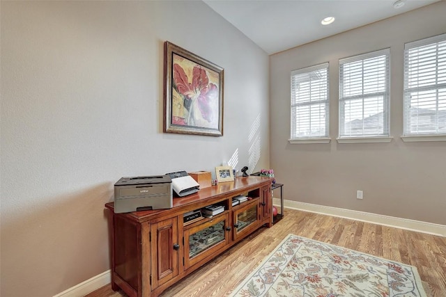 2210 Onion Creek Pkwy Unit 603, Austin, TX 78747 - home office with plenty of natural light, baseboards, and light wood-style floors