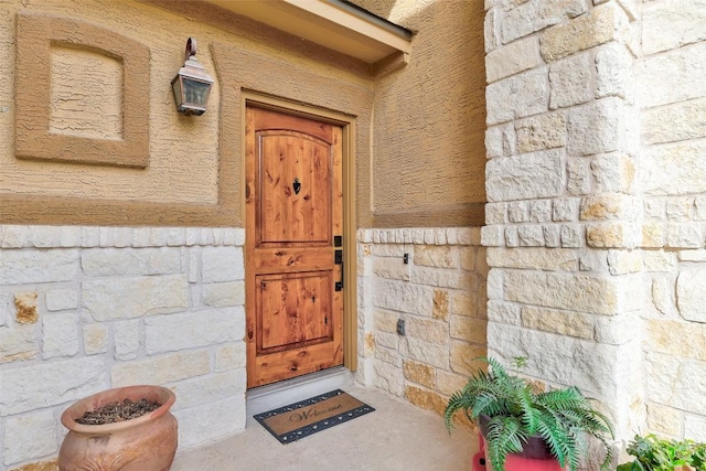 2210 Onion Creek Pkwy Unit 603, Austin, TX 78747 - view of exterior entry with stone siding